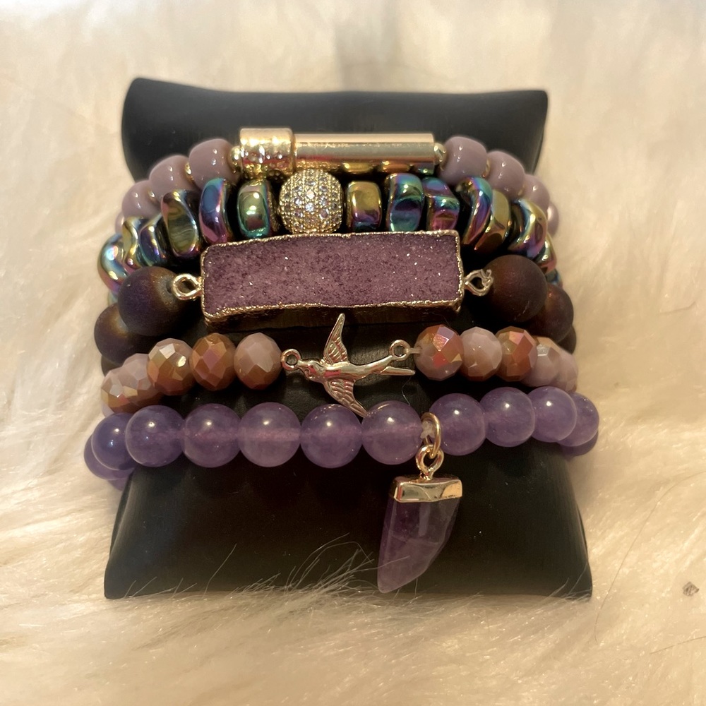 NWT Purple “Blooming Bushel” Bracelet Stack. Set of (5) stretch bracelets.